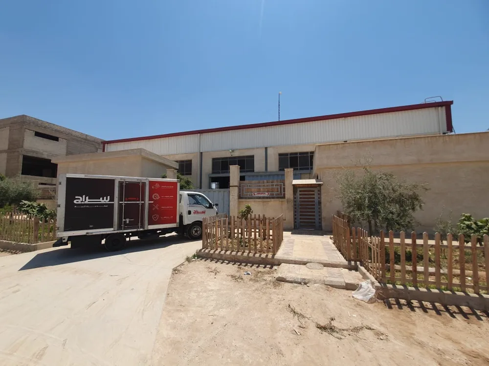 The Sarraj delivery truck loaded outside the workshop